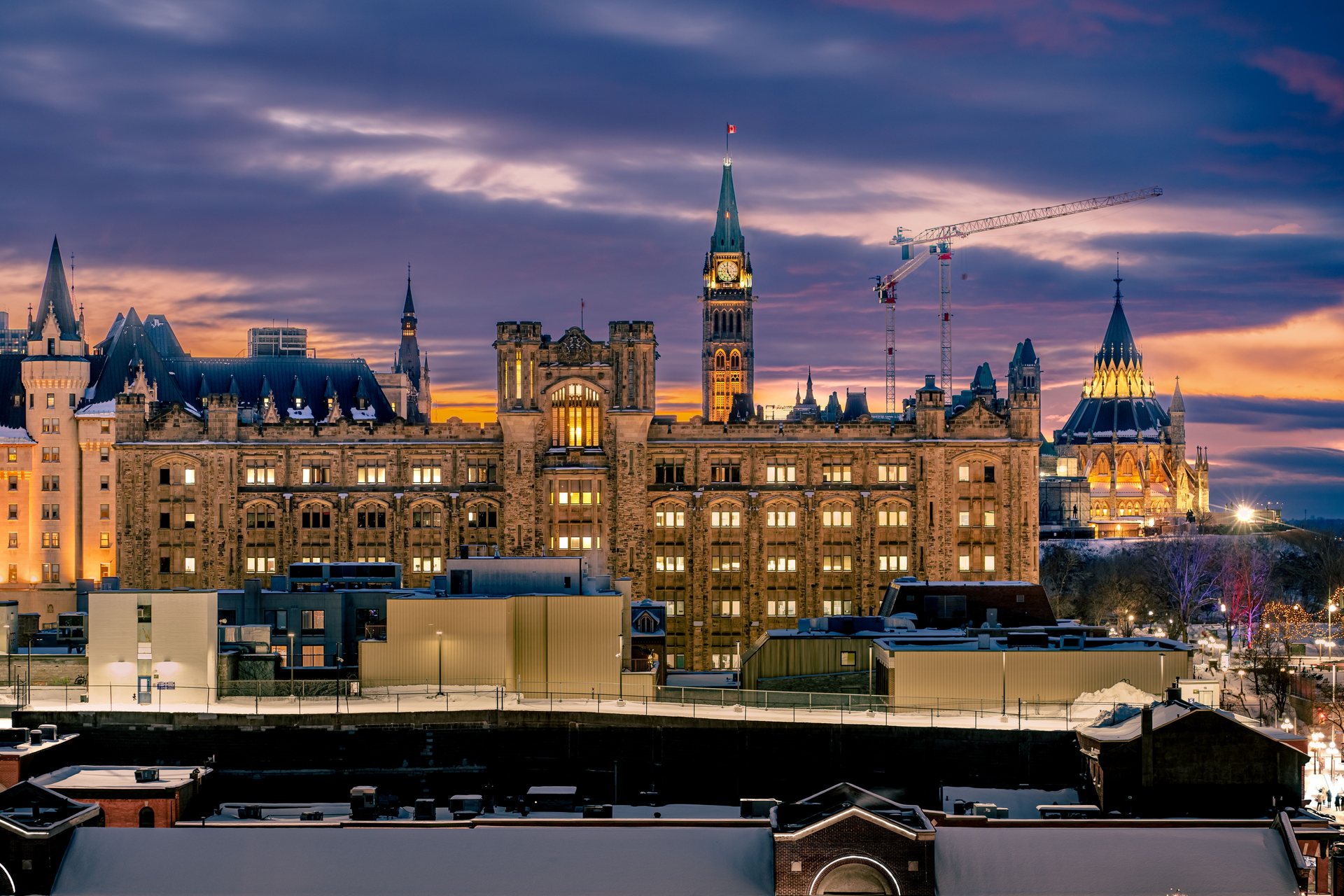 Parliament Hill in Ottawa at sunset, where Canadian intelligence is overseen