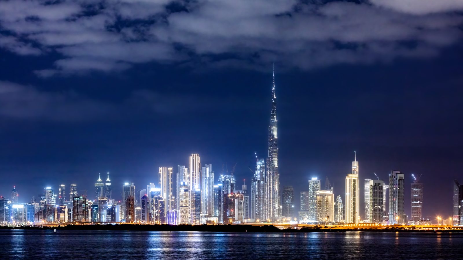 Dubai skyline at night with the Burj Khalifa