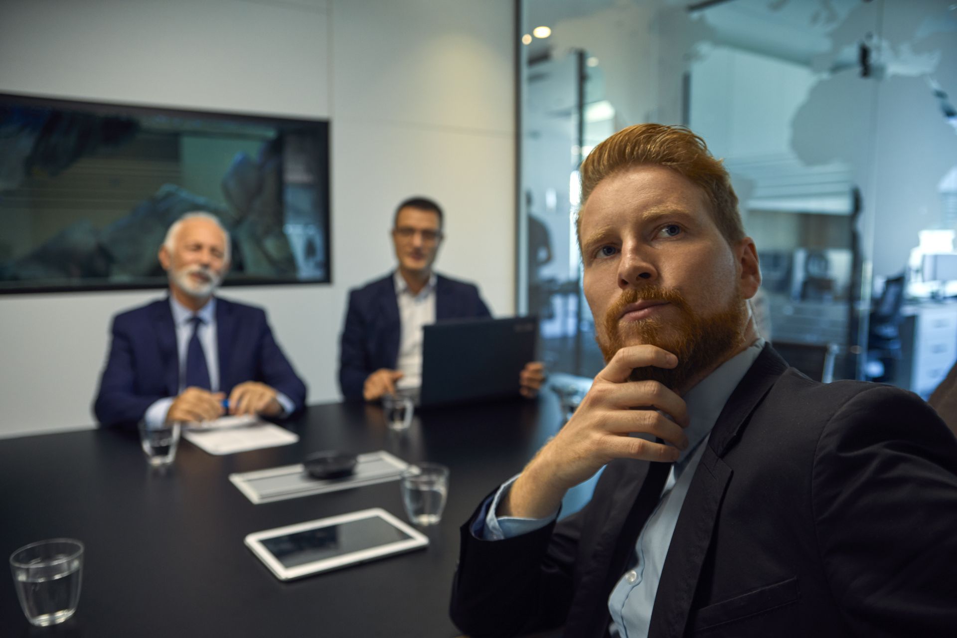 Executives listening skeptically in a boardroom, the audience you need to communicate foresight to
