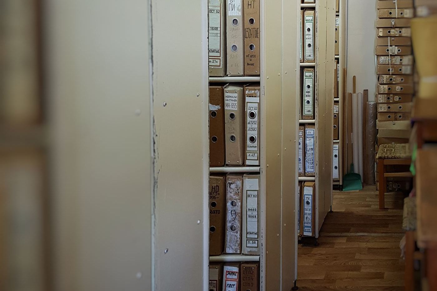 Rows of archive files, recalling the StB secret police records at the center of Czech intelligence history