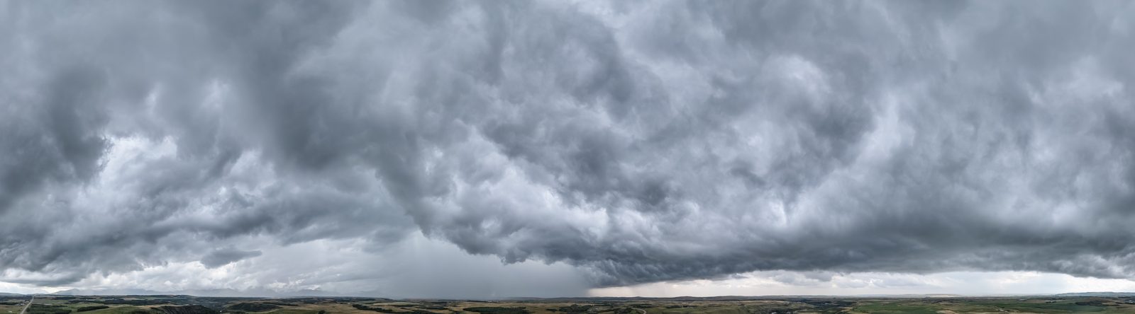 Storm clouds gathering over open plains, illustrating how to evaluate a forecast under uncertainty