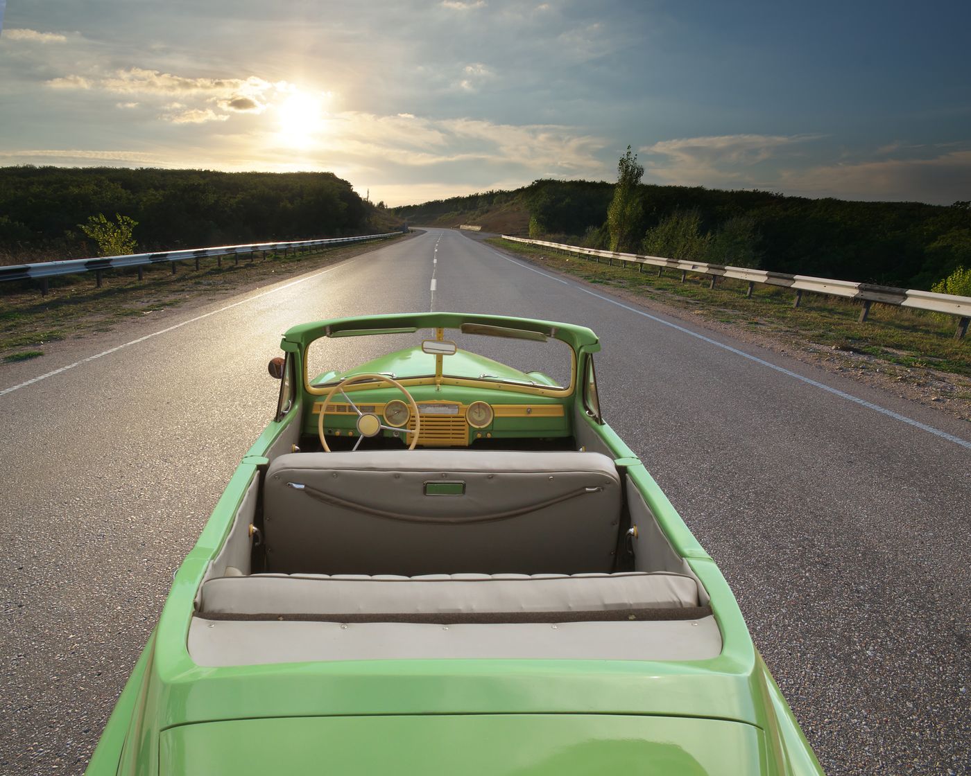 A vintage convertible on an open road: the mass-produced automobile, the classic Futures Wheel example of second-order effects