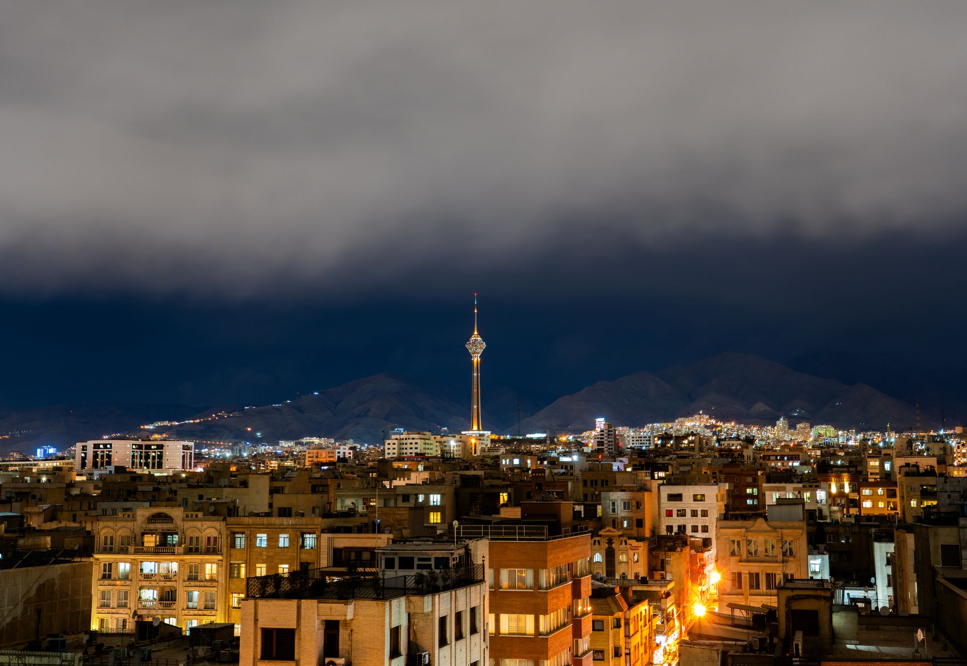 Tehran skyline at night with the Milad Tower, home of Iranian intelligence