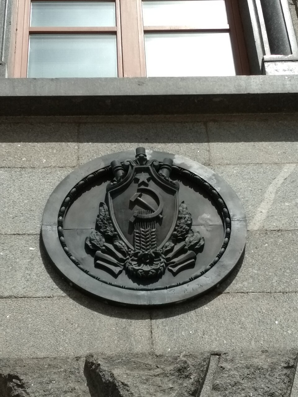 The KGB shield-and-sword emblem on the Lubyanka building in Moscow, symbol of Russian intelligence