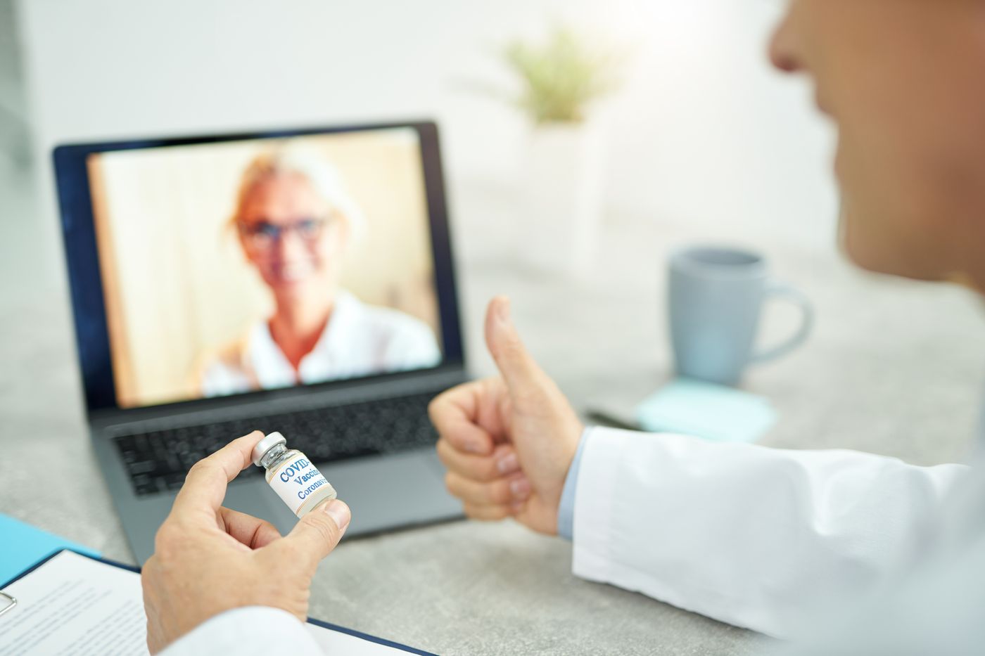 A doctor consulting a patient by video, the telemedicine scenario from Future, Inc. that scenario planning anticipated
